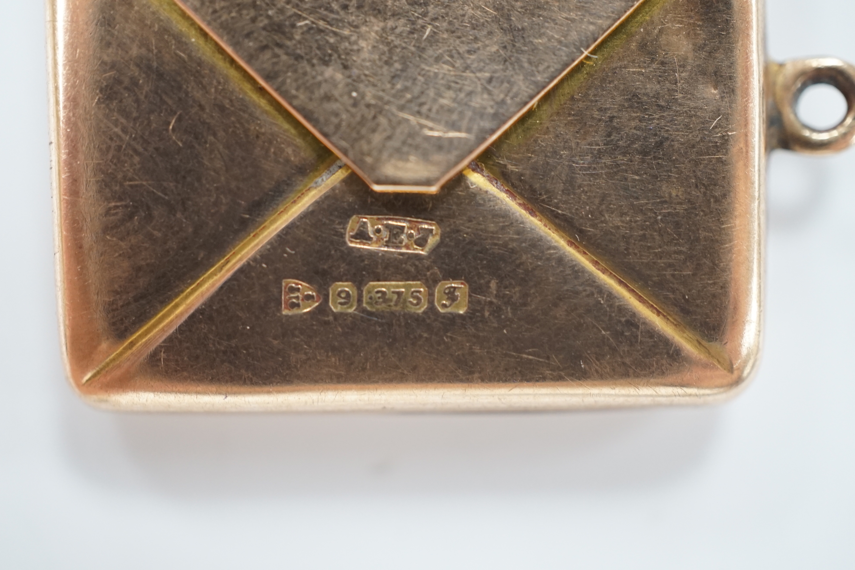 An Edwardian 9ct gold 'envelope' stamp case, Albert Ernest Jenkins, Chester, 1906, 26mm, 4.1 grams, with engraved monogram.